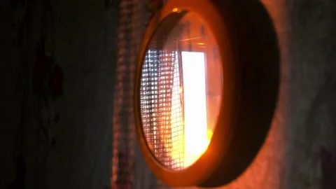 The dawn is reflected in the wall clock Stock Footage 208332308