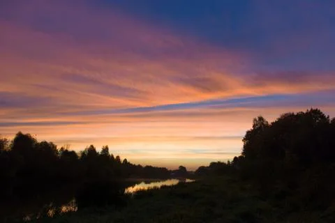 Dawn on river Stock Photos