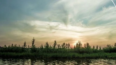 Dawn on the river in summer, summer landscape, time-lapse Stock Footage 73788767