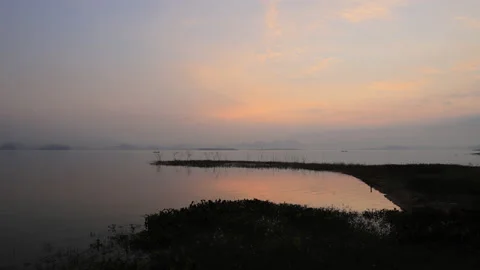 Dawn scenery at the waterfront Video stock 232303708
