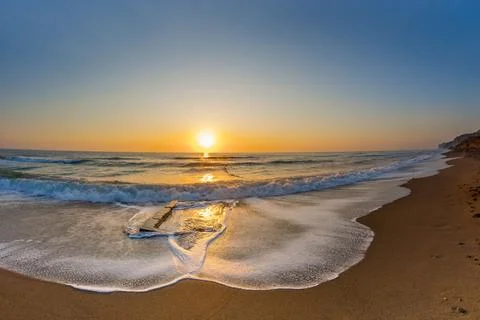 Dawn by the sea Stock Photos
