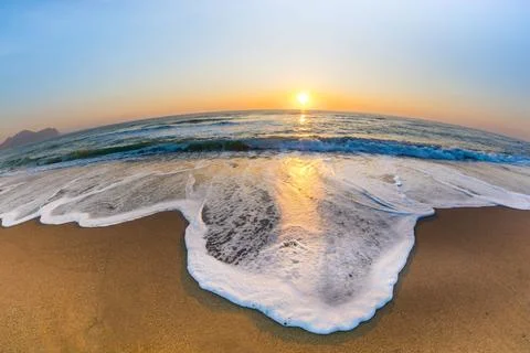Dawn by the sea Stock Photos