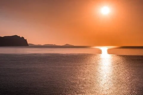 Dawn by the sea Stock Photos