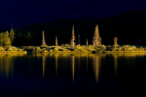 Dawn on Swiftcurrent Lake Stock Photos
