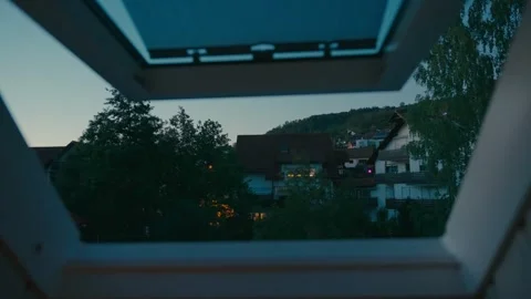 Dawn View from a Skylight Window Overlooking a Suburban Neighborhood 库存影片 331164811