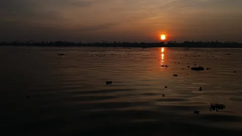 Dawn on the water bright orange Stock Footage 269359402
