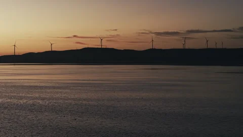 Dawn Wind Turbines Lake Warm Glow Stockbeeldmateriaal 343319728