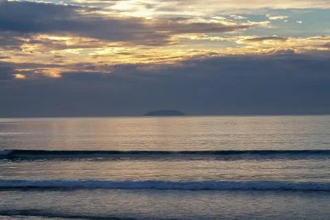 Dawning on the beach Stock Photos