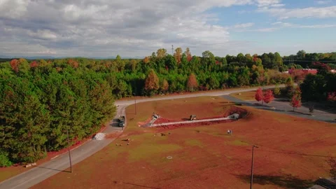 Dawsonville, Georgia construction site in the woods raising up by drone in Stock Footage 255026053