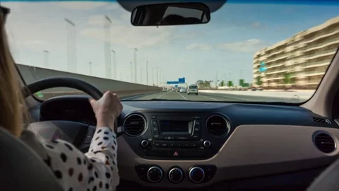 Day abu dhabi traffic road trip women driver backside view 4k time lapse uae Stock Footage 74900441