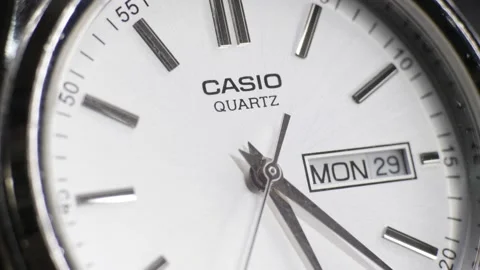 Day and Date Casio analog quartz watch macro shot. Stock Footage