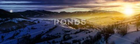 Day and night panorama of winter countryside Stock Photos