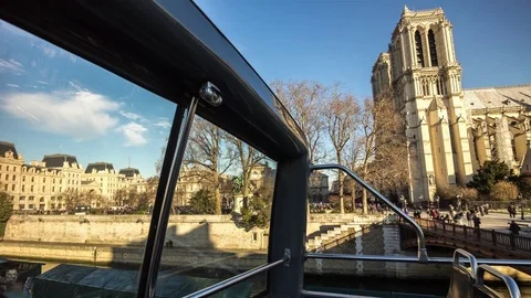 Day bus rooftop notre-dame de paris cathedral riverside 4k time lapse france Stock Footage 74691358