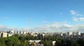 Day city timelapse, buildings houses, clouds move pass sun shine HD Footage