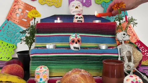 Day of the Dead Altar. Hand lighting candles. Mexico. Stock Footage 208844291