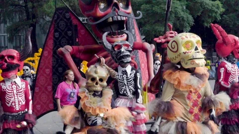 Day of the Dead - Beautiful Large Red and Black Devil themed float. Stock Footage 118569195