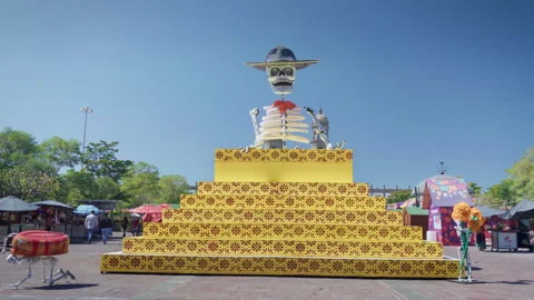 Day of the Dead decoration pyramid and skeleton at Zapopan Basilica plaza Видео 346328060
