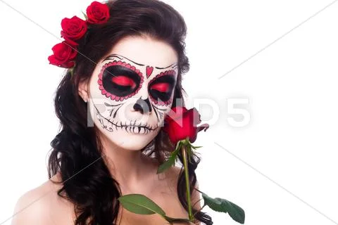 Day of the dead. Halloween. Young woman in day of the dead mask skull face art Stock Photos