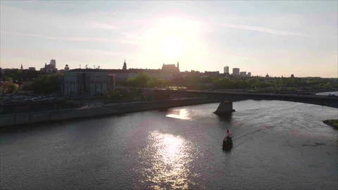 Day drone rising with river foreground and city background, Warsaw 스톡 동영상 339173071