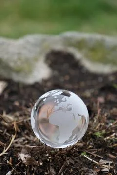 Day of Earth concept with space for text, glass globe in nature Stock Photos