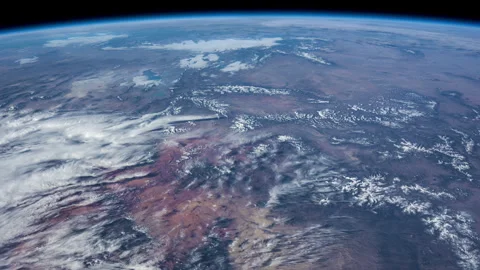 Day Earth Slow Rotation White Clouds Colorful Mountains From ISS. Stock Footage 330776272