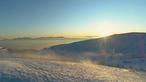 Day end time above snow covered mountains with blue sky Stock Footage 121513134