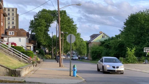 Day Establishing Shot of Typical Middle Class Neighborhood Intersection Stock Footage 133433139