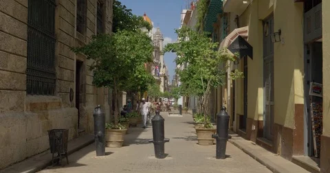 Day Establishing Shot of Typical Street Activity in Havana Cuba Stock Footage