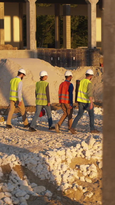 A day in the life of construction workers at a bustling site Stock Footage 319612863