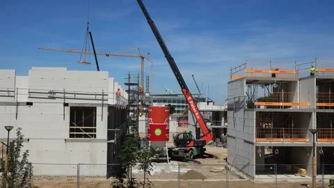 Day in the life of a crane on a construction site time lapse moving around Stock Footage 199053493