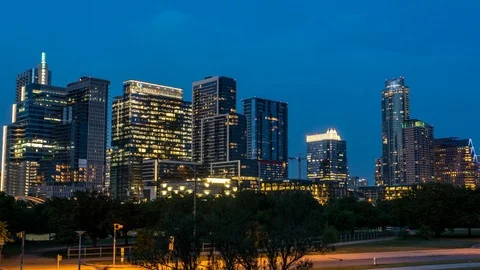 Day to night Hyperlapse of Austin, Texas skyline from Butler Metro Park Stock Footage 106910510
