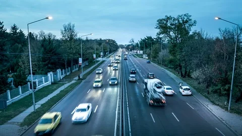 Day to night intense traffic time lapse video Stock Footage 99430084