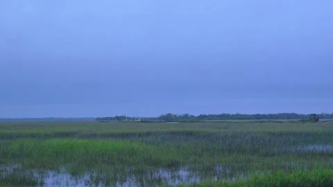 Day to Night Marsh High Tide Time-Lapse Stock Footage 203970547