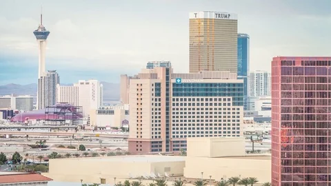 Day to night moving timelapse of vegas strip including stratosphere Stock Footage 83319863