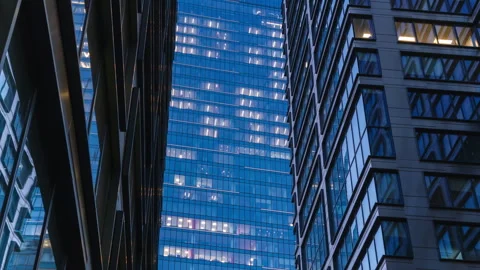 Day night office windows timelapse skyscrapers financial district glass building Stock Footage 301722033