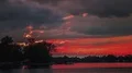 Day to night over lake. 4k or 4k+ Resolution