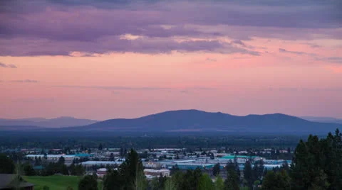 Day to Night over small town Stock Footage 24974507