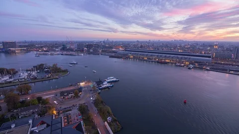 From day to night panoramic view of the Amsterdam city and central station Stock-Footage 102708403