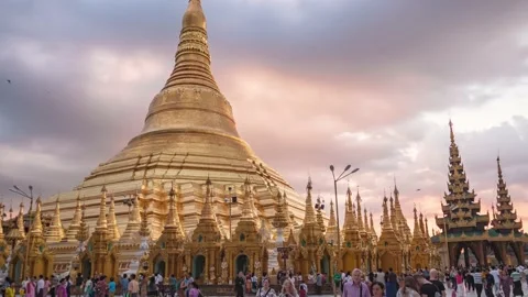 Day to Night Sunset Panning Timelapse of the Shwedagon pagoda in Yangon, Myanmar Stock Footage 140059774