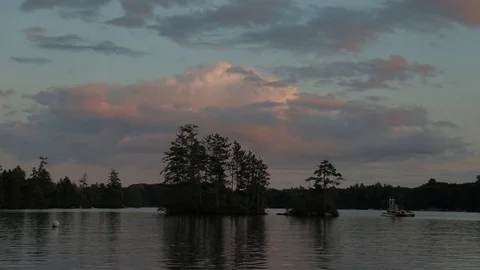 Day to night sunset time lapse over a lake in New Hampshire Stock Footage 80773121