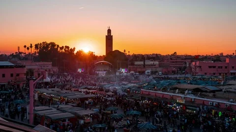 Day to night sunset time lapse medina Jamaa El Fna Square of Marrakech, Morocco Stock Footage 84294332