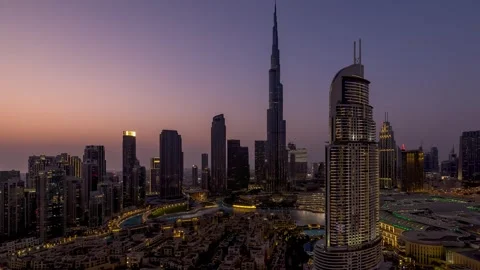 Day to night sunset time lapse view of the skyline of Dubai Stock Footage 261189844