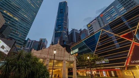 Day to night sunset timelapse of Raffles Place in Singapore. ProRes 422 in 4k Stock Footage 100584898