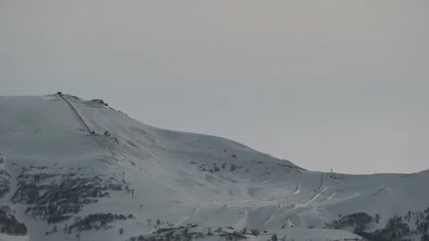 Day to night time lapse of beautiful snowy mountain in Bakurian. Georgia Stock-Footage 150748646