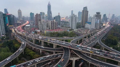 Day to night time lapse of busy elevated road junction &amp; skyline, Shanghai Video stock 69908363
