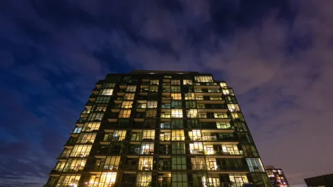 Day to night time lapse of a condo building in Toronto Canada. Stock Footage 148337319