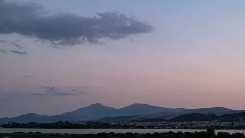Day to night time lapse of lake and city of Ioannina in Greece with big mountain Stock-Footage 201428917