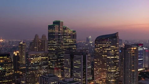 Day to night time lapse of modern building in business zone at Bangkok Stock Footage