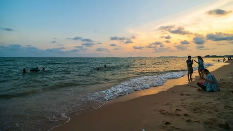 Day to night time lapse of Nam Rin Beach with sunset at Rayong, Thailand Stock Footage 123338145
