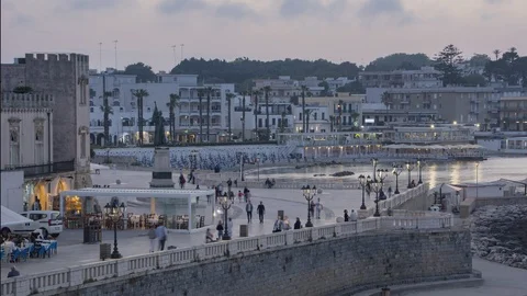 Day to night time lapse of seafront piazza in Otranto, Salento Stock Footage 111318635
